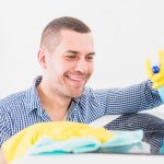 man-cleaning-his-home_23-2148112017