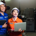 portrait-asian-emgineer-male-female-technician-safty-uniform-standing-turn-around-look-camera-laugh-smile-with-cheerful-confident-machinery-factory-workplace-background_609648-144